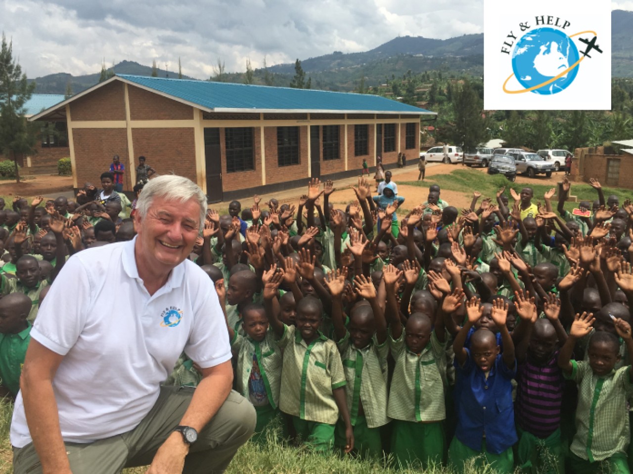 Man with children in an African school